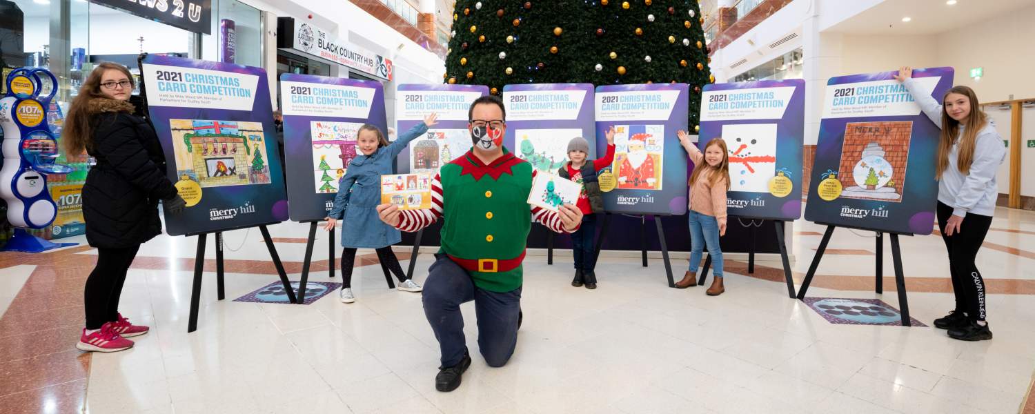 Mike Wood MP with 2021 Christmas card competition winners at Merry Hill